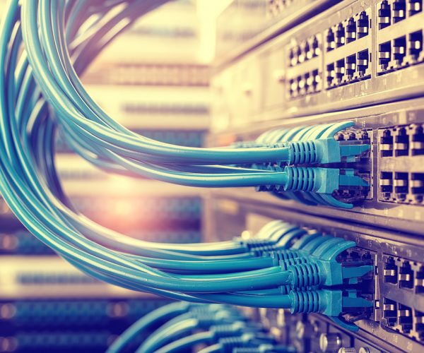Network switch and ethernet cables,Data Center Concept. A series of network switches and Ethernet cables.