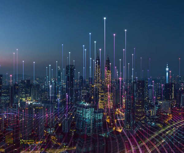 Rendering of a city at night with beams of light representing connection rising into the sky.